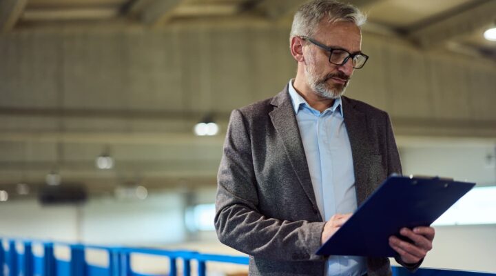 procurement-manager-reviewing-manufacturing-contract-factory